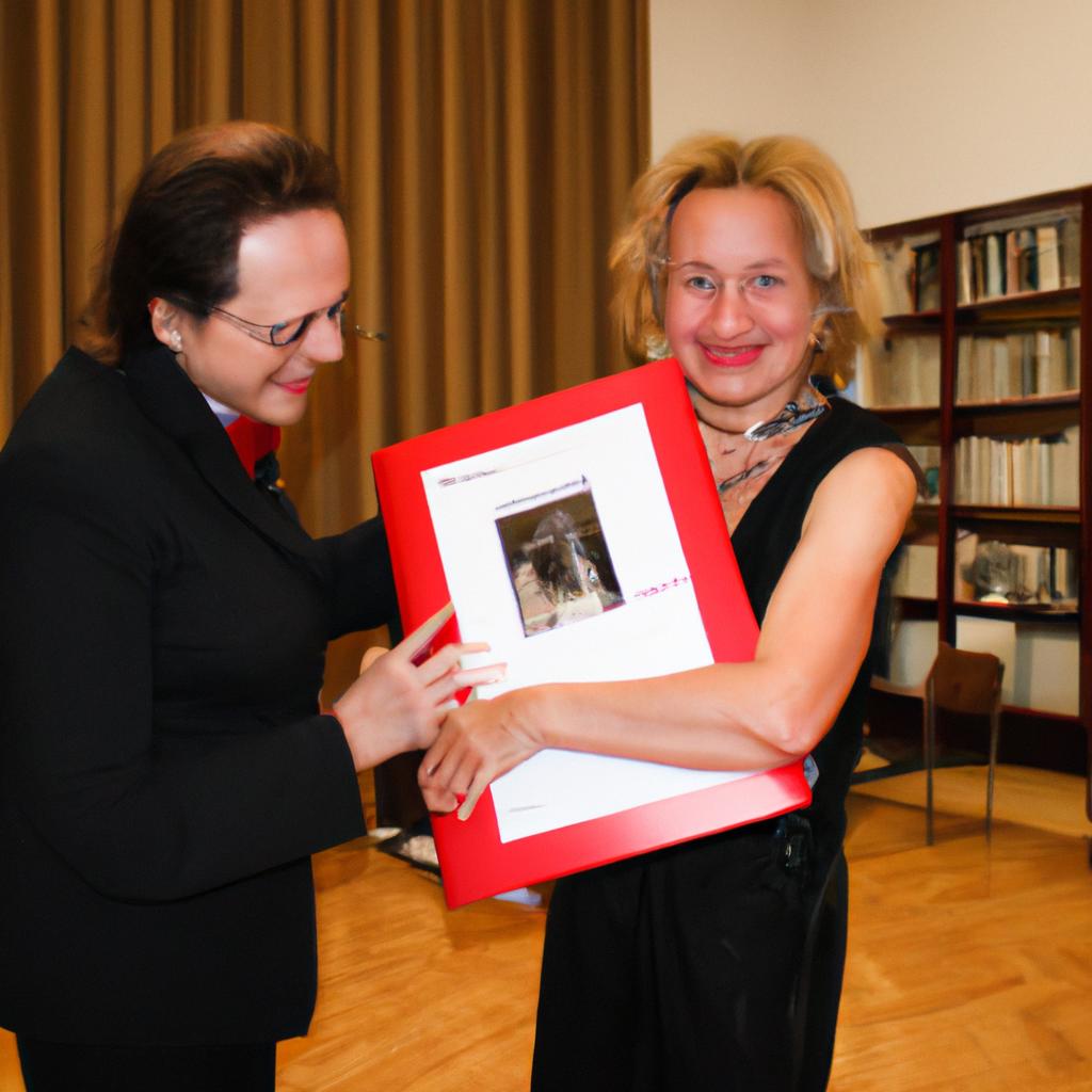 Woman receiving literary award